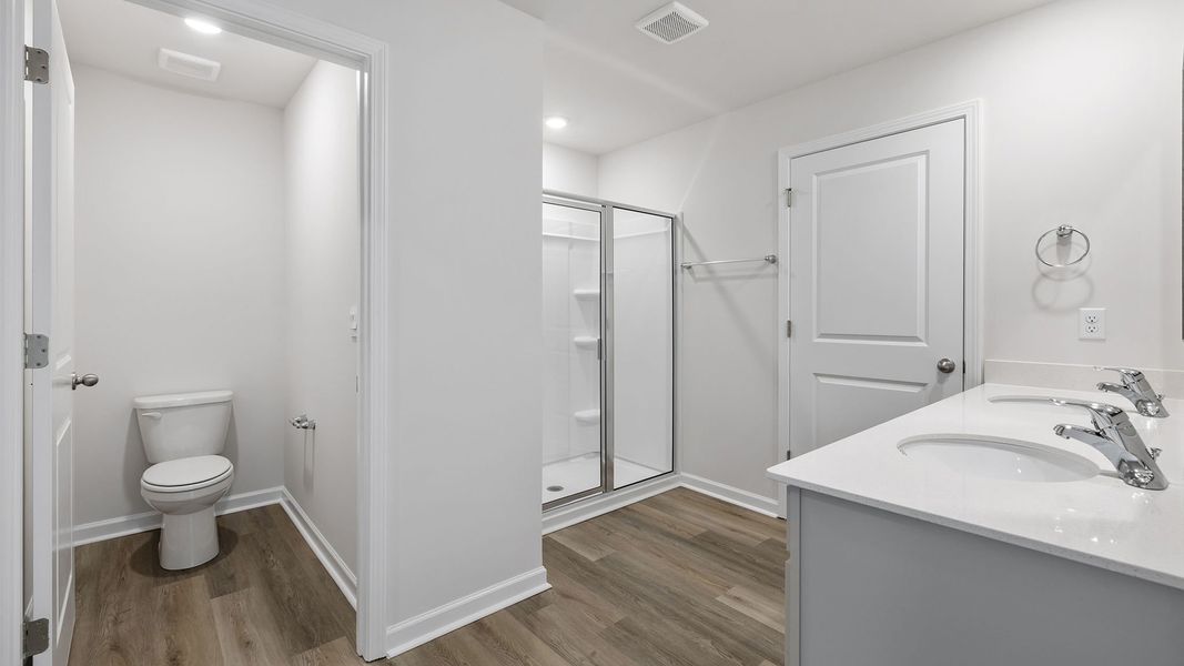 Furnished interior view inside a new home in Bentley Park, Greenwood (Image 14).