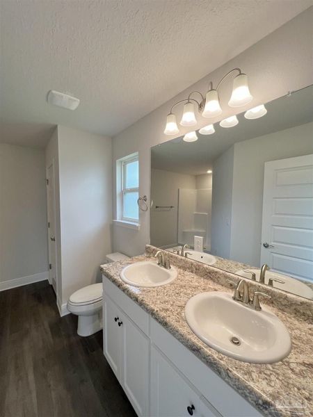 Furnished interior view inside a new home in Pine Top, Cantonment (Image 7).