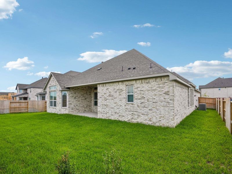 Exterior details and patio area of a home in Massey Oaks - Estate Series, Pearland (Image 3).