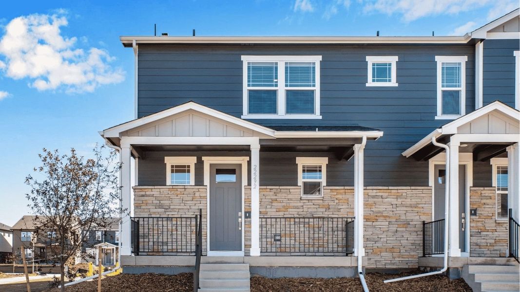 Front exterior of a new home in Horizon Uptown, Aurora, CO, highlighting curb appeal (Image 1). Front exterior of a new home in Horizon Uptown, Aurora, CO, highlighting curb appeal (Image 1).