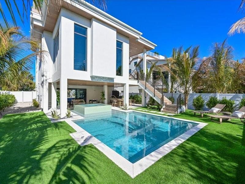 Exterior details and patio area of a home in , Anna Maria (Image 23).