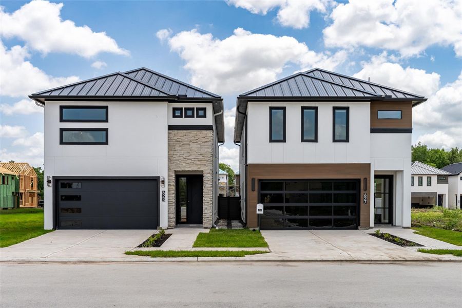 Designer-grade metal roof, energy-efficient 2x6 exterior walls, and upscale contemporary finishes define the lasting quality of this custom-built home Designer-grade metal roof, energy-efficient 2x6 exterior walls, and upscale contemporary finishes define the lasting quality of this custom-built home