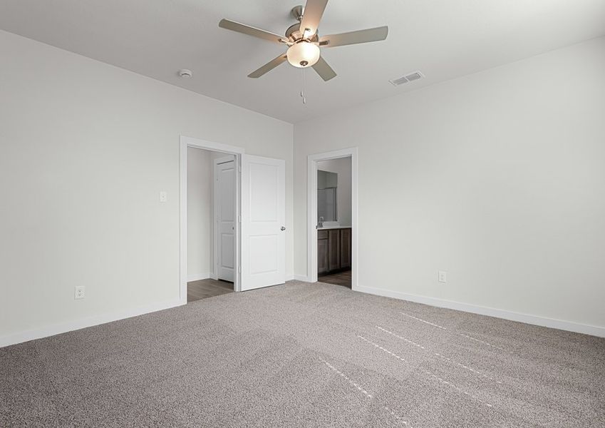 The master suite has a large bedroom, ensuite bathroom and a walk-in closet.