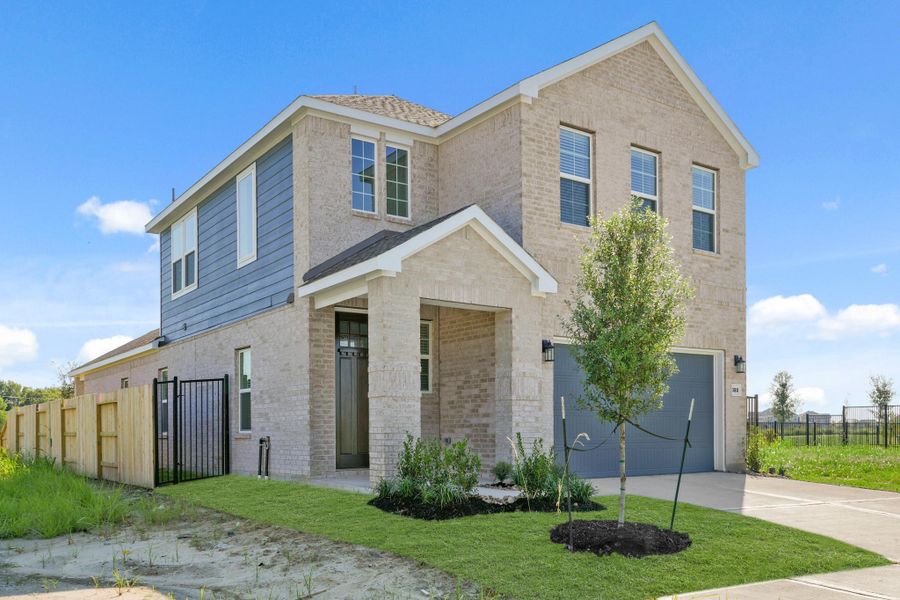 Front exterior of a new home in River Ranch Trails, Dayton, TX, highlighting curb appeal (Image 2). Front exterior of a new home in River Ranch Trails, Dayton, TX, highlighting curb appeal (Image 2).