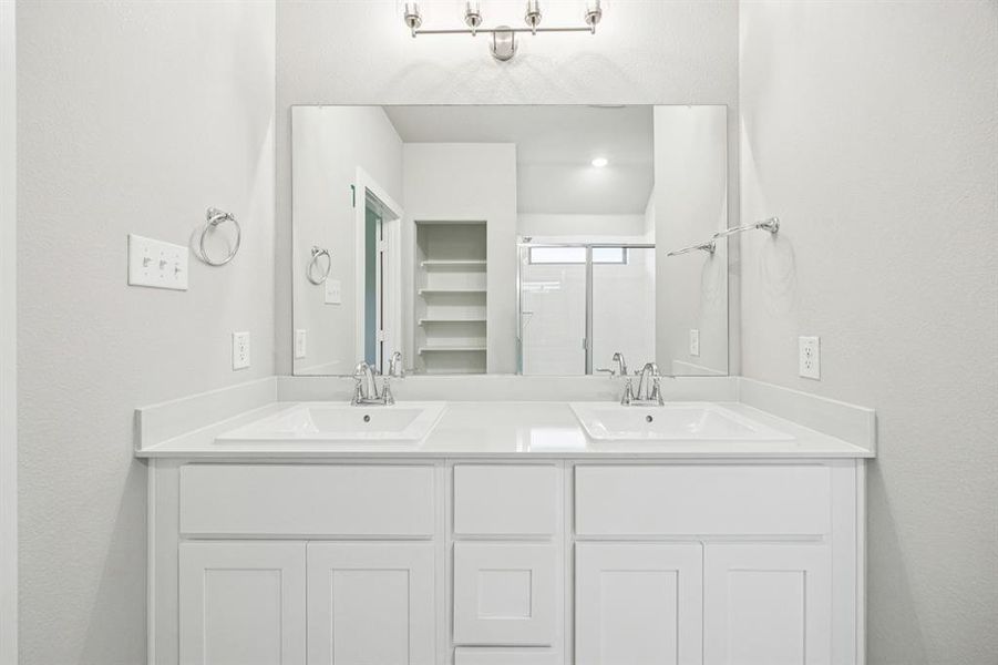 Primary Bathroom in the Oscar home plan by Trophy Signature Homes – REPRESENTATIVE PHOTO Primary Bathroom in the Oscar home plan by Trophy Signature Homes – REPRESENTATIVE PHOTO