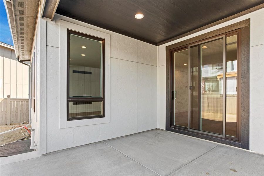 Exterior details and patio area of a home in West Grange, Longmont (Image 4).
