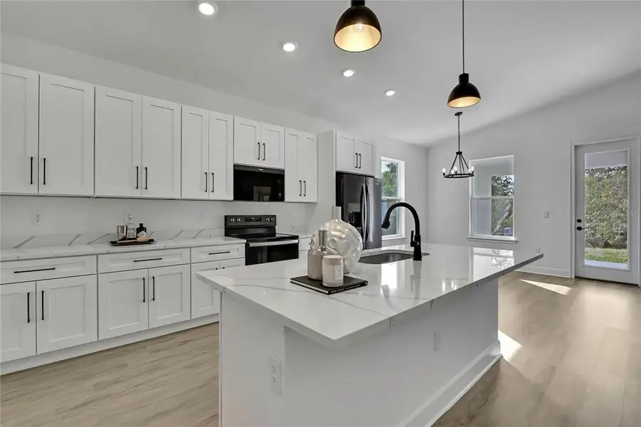 Furnished interior view inside a new home in , Weeki Wachee (Image 9).