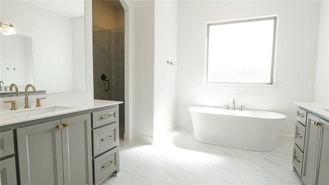 Bathroom with vanity and tile patterned flooring Bathroom with vanity and tile patterned flooring