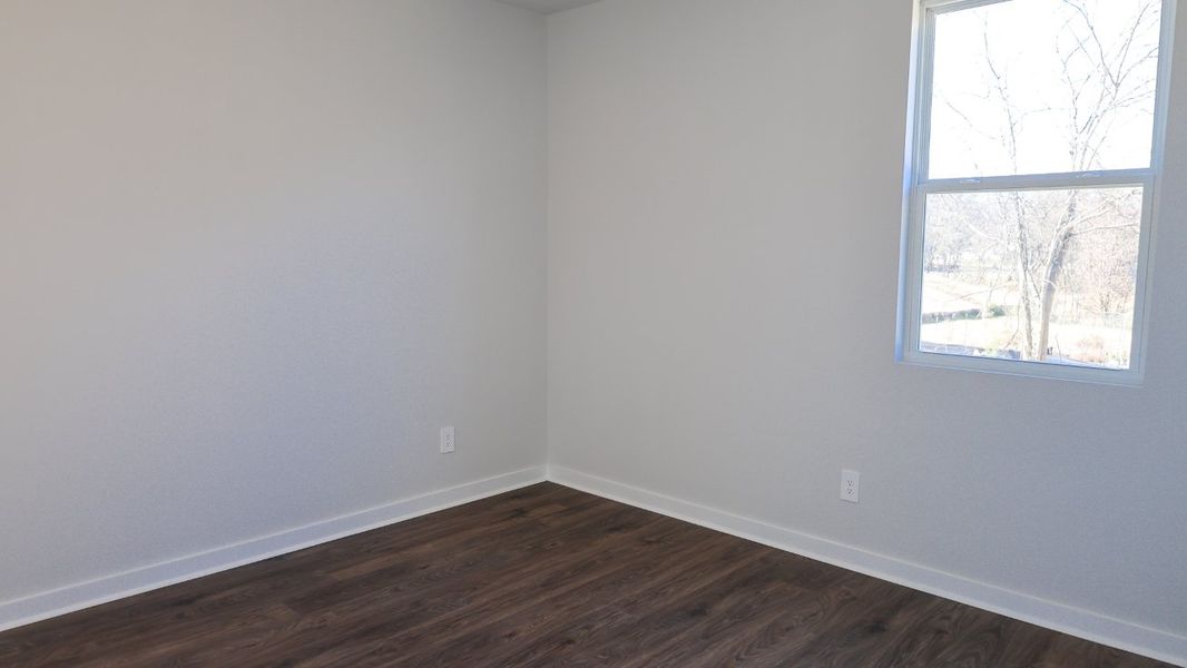 Representative unfurnished interior of a home built from the TISDALE by D.R. Horton in Harvest Point, Spring Hill (Image 43).
