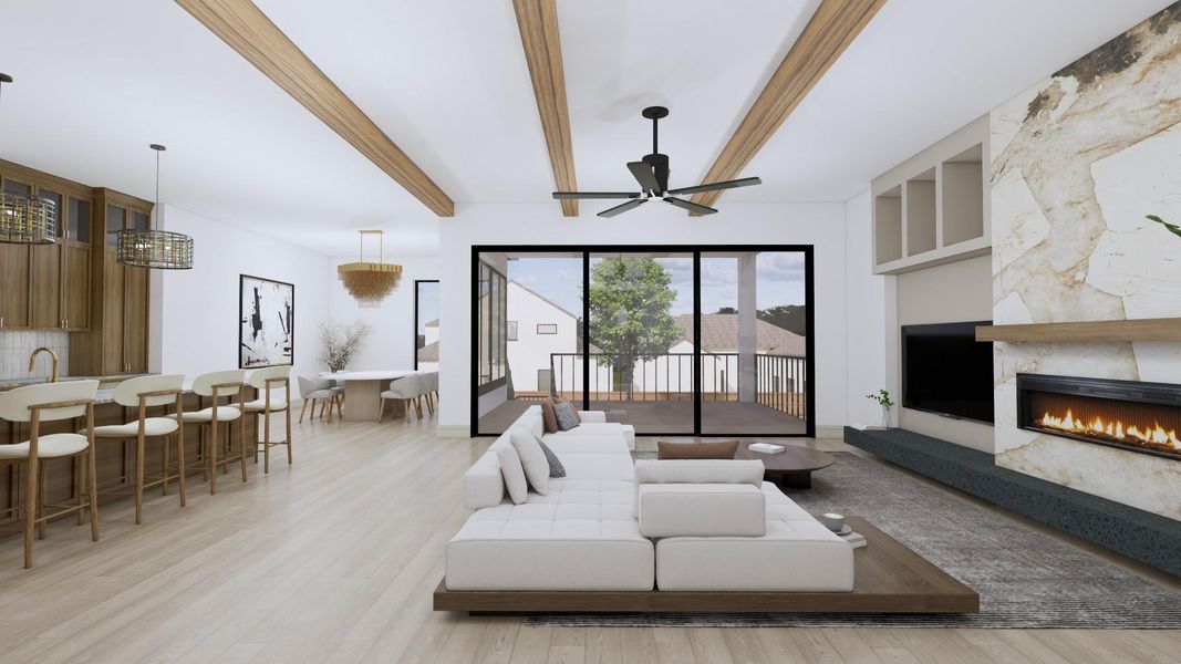 Relax and entertain in the spacious family room, open to the kitchen with direct access to the terrace. The fireplace wall features stone and floating hearth.