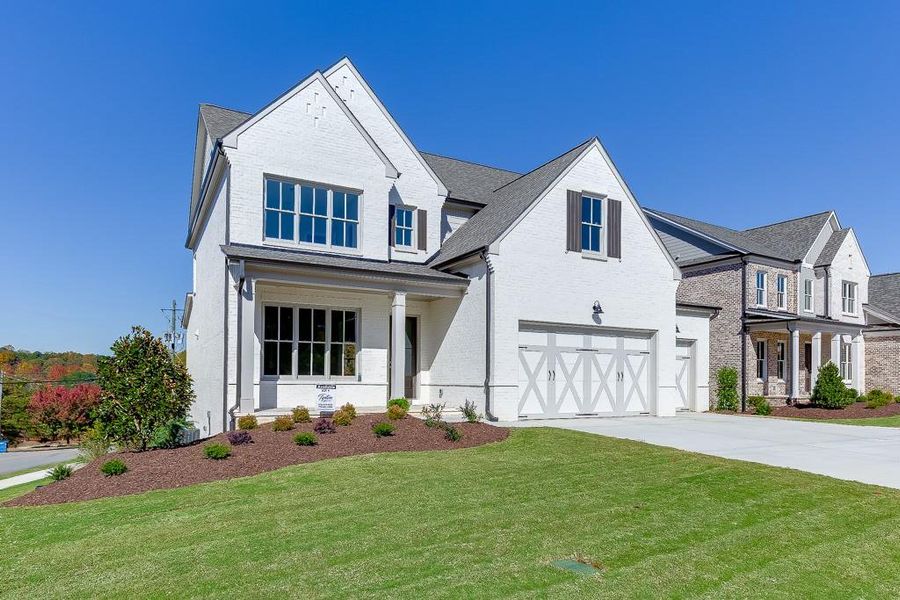 Front exterior of a new home in , Buford, GA, highlighting curb appeal (Image 1). Front exterior of a new home in , Buford, GA, highlighting curb appeal (Image 1).