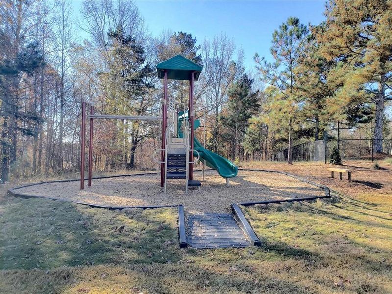 Front exterior of a new home in Twin Lakes, Hoschton, GA, highlighting curb appeal (Image 21).