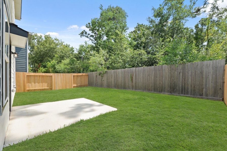 Front exterior of a new home in Maple Heights, Porter, TX, highlighting curb appeal (Image 9). Front exterior of a new home in Maple Heights, Porter, TX, highlighting curb appeal (Image 9).