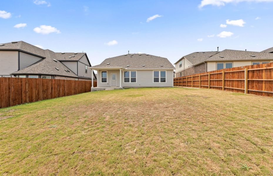Exterior details and patio area of a home in Saddleback at Santa Rita Ranch, Liberty Hill (Image 4).