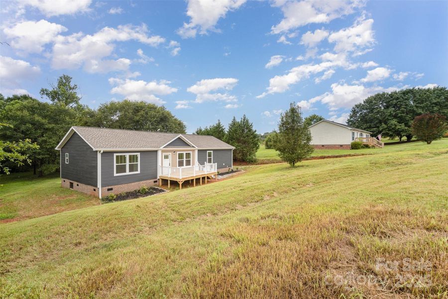 Front exterior of a new home in , Shelby, NC, highlighting curb appeal (Image 1).