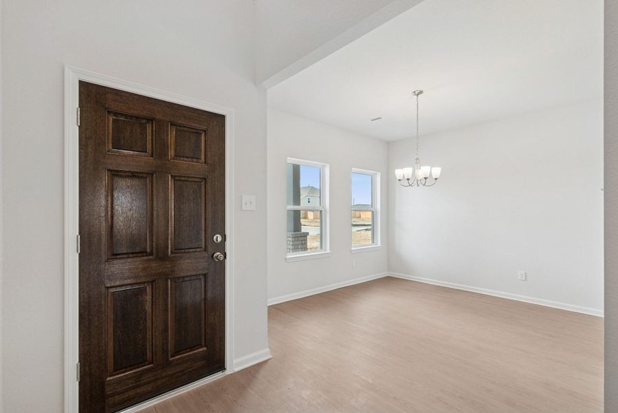 The Georgetown II- Foyer into Dining Room. Home under construction, photo used for illustrative purposes only, colors and options will vary.