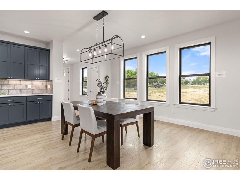 Furnished interior view inside a new home in Cottages at Kelly Farm, Greeley (Image 7).
