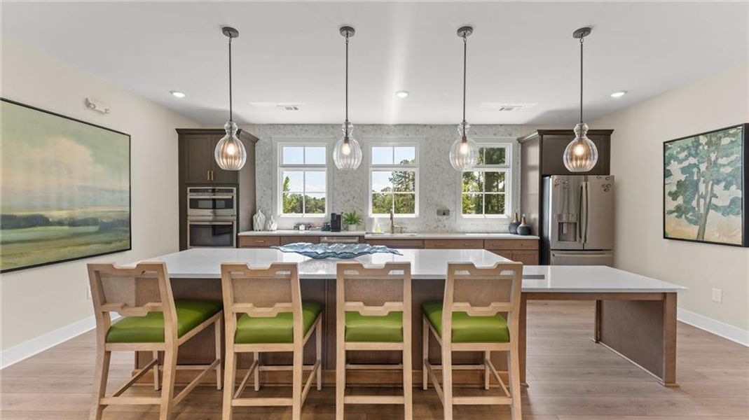 Furnished interior view inside a new home in The Courtyards at Bailey Farms, Dacula (Image 10).