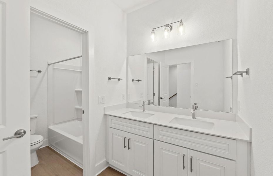 Furnished interior view inside a new home in Northpoint at Old Settlers, Round Rock (Image 7). Furnished interior view inside a new home in Northpoint at Old Settlers, Round Rock (Image 7).