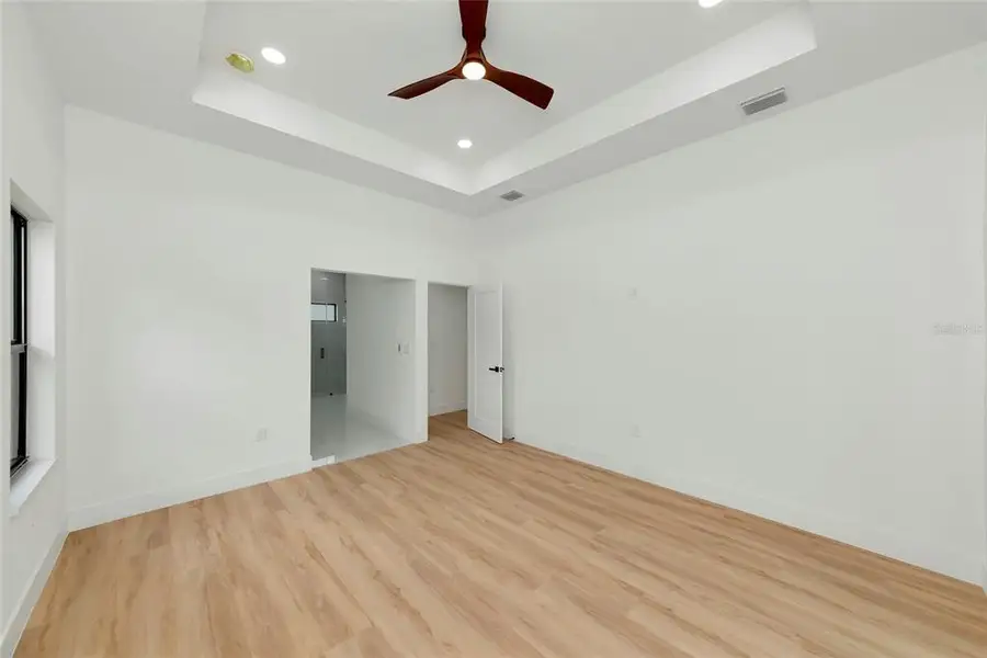Spacious, unfurnished interior of a new home in , North Port (Image 39).