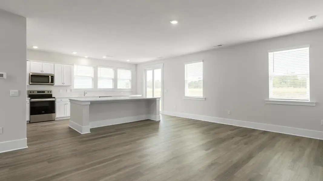 Spacious, unfurnished interior of a new home in The Highlands at Cedar Hill Landing, Navassa (Image 16).