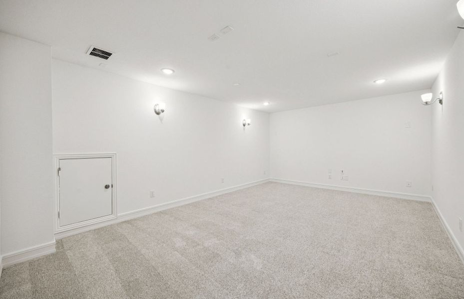 Deep media room perfect for movie nights and entertainment  *Real home pictured