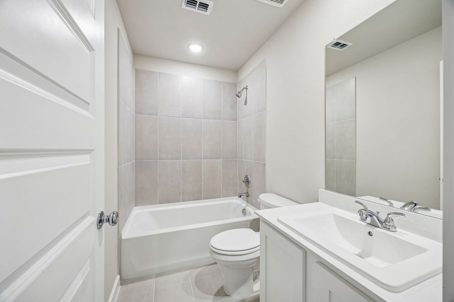 Bathroom in the Willow home plan by Trophy Signature Homes – REPRESENTATIVE PHOTO
