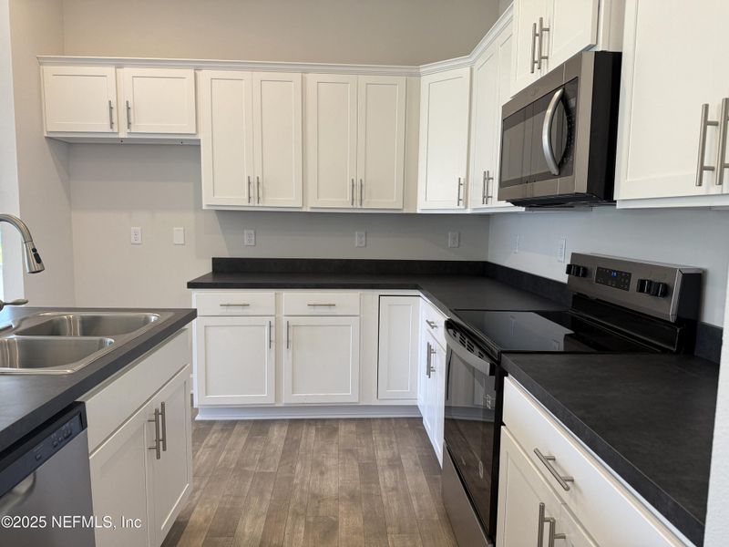 Furnished interior view inside a new home in Summerglen, Jacksonville (Image 14).