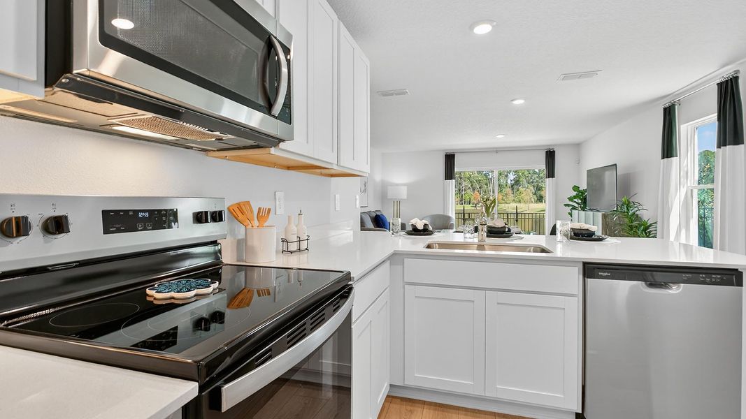 Furnished interior in a model home at Trout River in Jacksonville (Image 18).