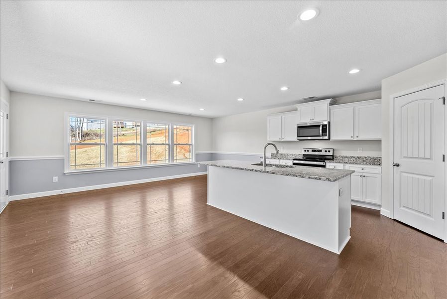 Representative furnished interior of a home built from the Emilia by Enchanted Homes in Messer Farms, Inman (Image 9). Representative furnished interior of a home built from the Emilia by Enchanted Homes in Messer Farms, Inman (Image 9).