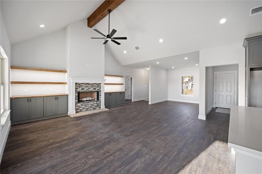 View from the dining area - entry, living room, flex space - hall leading to the 2 beds & bath to the right of the fireplace. Hall leading to the pantry, mud room, laundry and garage on the right of the photo