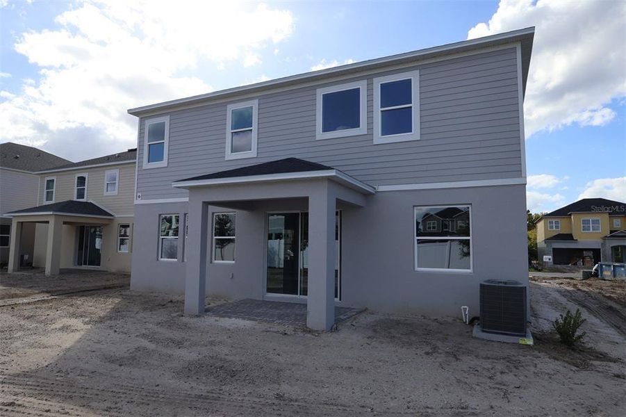 Exterior details and patio area of a home in Estates at Rivercrest, Sanford (Image 2). Exterior details and patio area of a home in Estates at Rivercrest, Sanford (Image 2).