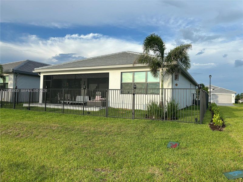 Exterior details and patio area of a home in , Port St. Lucie (Image 21).