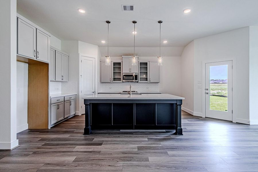 Expansive main living space with clear sightlines to the heart of the home Expansive main living space with clear sightlines to the heart of the home