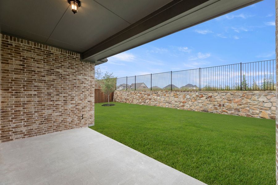 Exterior details and patio area of a home in Nelson Lake Estates, Rockwall (Image 4).