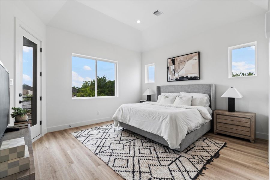 The primary bedroom features vaulted ceilings, a private door leading to your own covered patio, and a large window with a beautiful view to wake up to. The primary bedroom features vaulted ceilings, a private door leading to your own covered patio, and a large window with a beautiful view to wake up to.