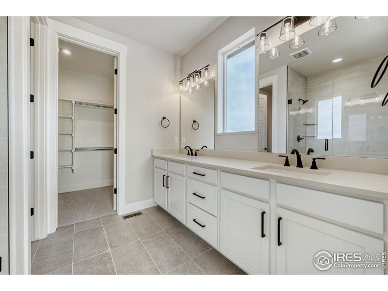 Furnished interior view inside a new home in Barefoot Lakes, Firestone (Image 9).