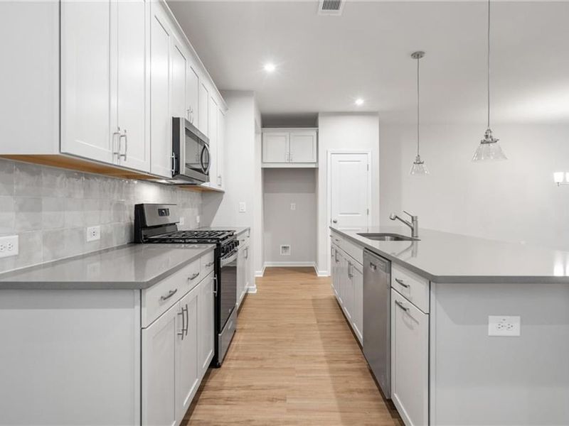 Furnished interior view inside a new home in The Village at Shallowford, Kennesaw (Image 14). Furnished interior view inside a new home in The Village at Shallowford, Kennesaw (Image 14).