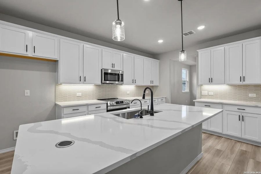 Furnished interior view inside a new home in Comanche Ridge, San Antonio (Image 7). Furnished interior view inside a new home in Comanche Ridge, San Antonio (Image 7).