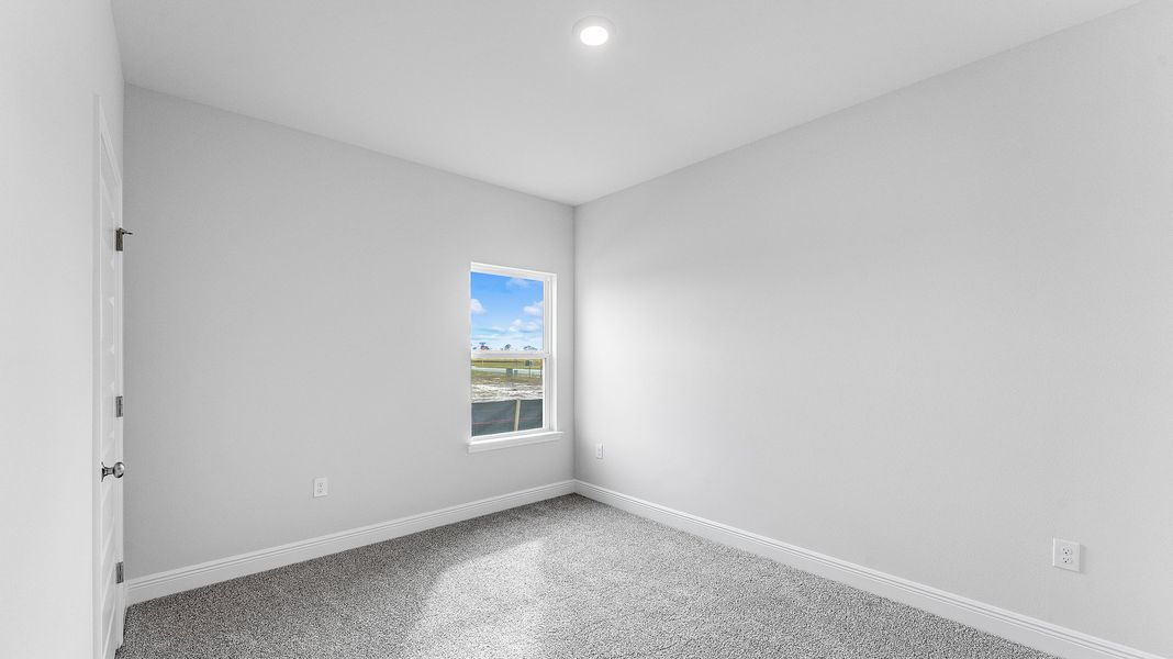 Representative unfurnished interior of a home built from the The Riverside by D.R. Horton in Hodges Bayou Plantation, Panama City (Image 31).