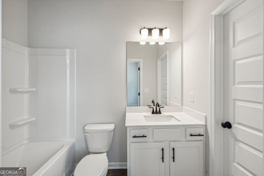 Furnished interior view inside a new home in Ponderosa Farms Manor, Gainesville (Image 18). Furnished interior view inside a new home in Ponderosa Farms Manor, Gainesville (Image 18).