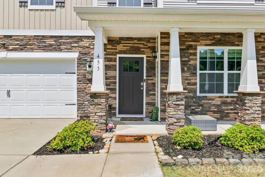Exterior details and patio area of a home in Crossroads, Locust (Image 4).