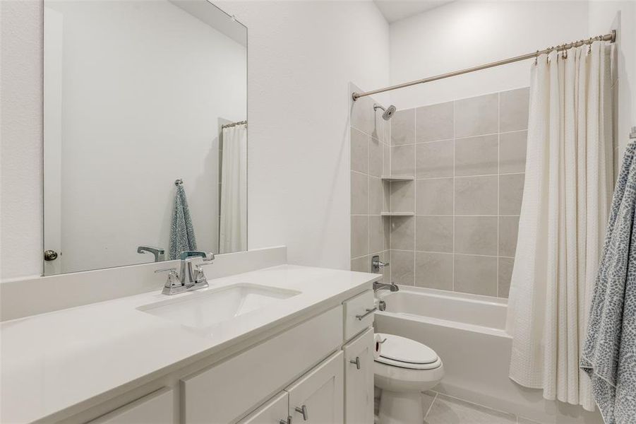 Furnished interior view inside a new home in Painted Tree - South, McKinney (Image 24).