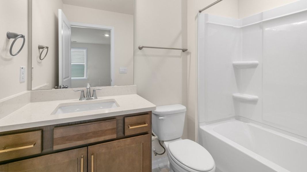 Representative furnished interior of a home built from the Hartwell by D.R. Horton in Kalas Falls, Wake Forest (Image 10).