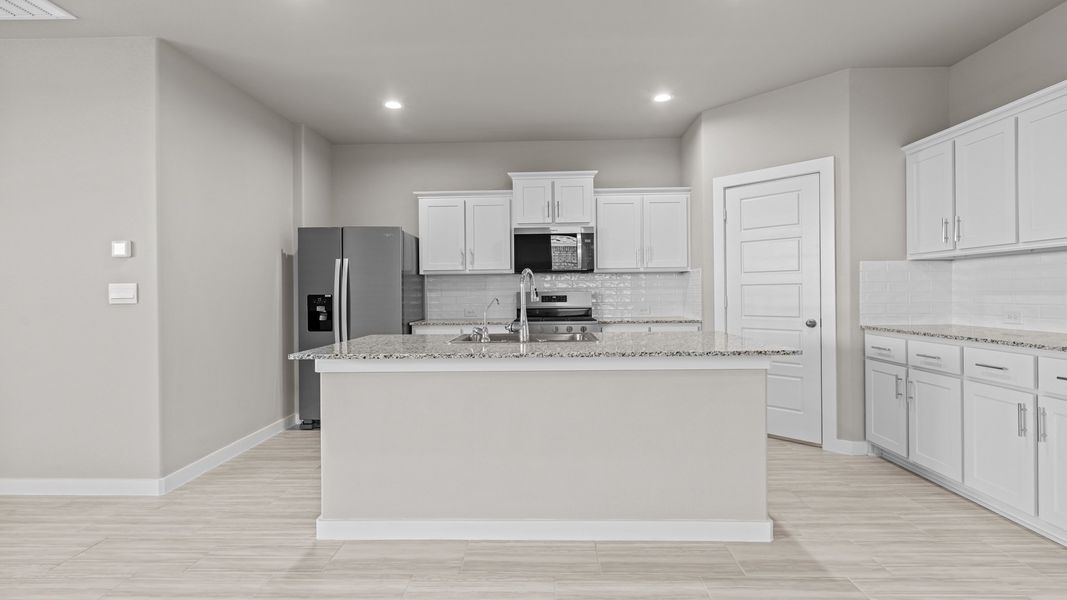 Representative furnished interior of a home built from the Jaxson by D.R. Horton in Legacy South, Midland (Image 6).