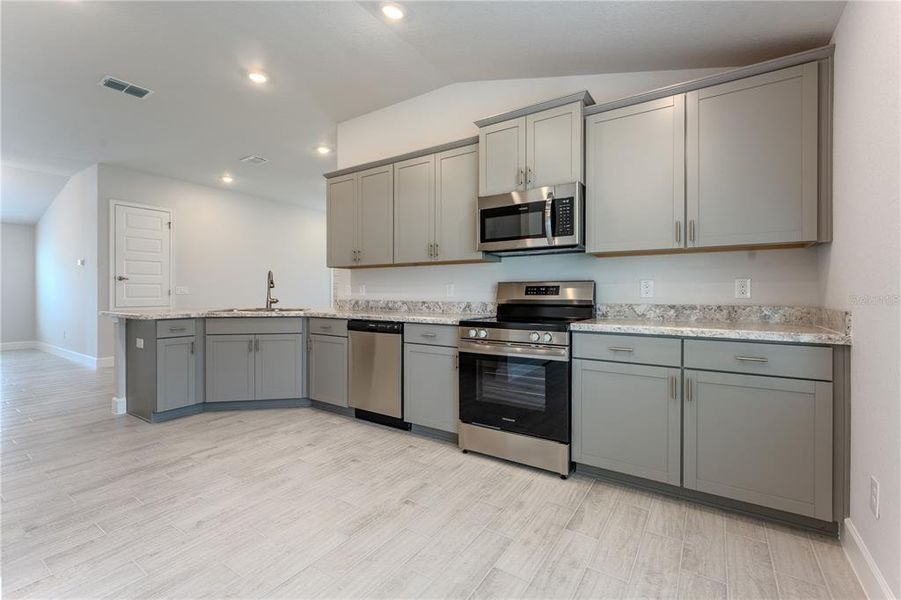 Furnished interior view inside a new home in Oak Hill Plantation, Ocala (Image 2). Furnished interior view inside a new home in Oak Hill Plantation, Ocala (Image 2).