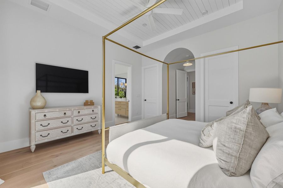 Arched entrance to owner's suite for architectural appeal & impact