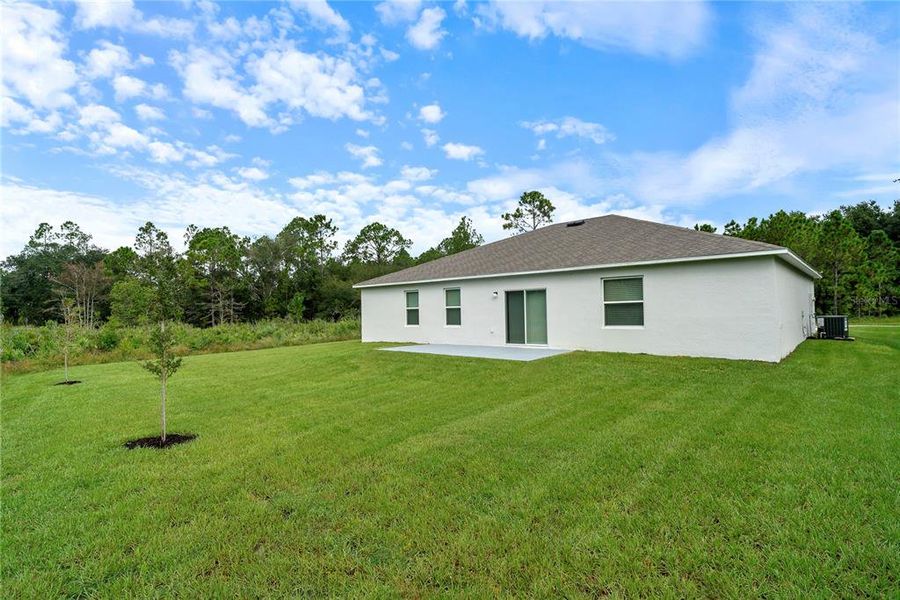 Exterior details and patio area of a home in Indian Lake Estates, Indian Lake Estates (Image 4).
