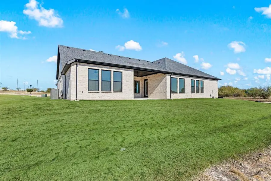 Exterior details and patio area of a home in Rolling Creek Ranch, Aledo (Image 4).