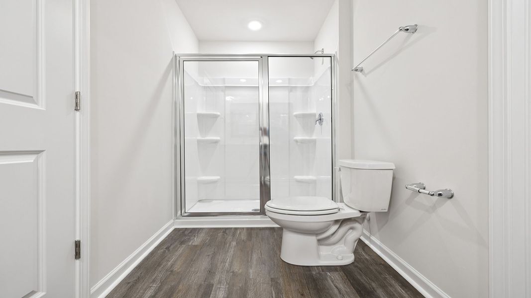 Spacious, unfurnished interior of a new home in Bentley Park, Greenwood (Image 26).